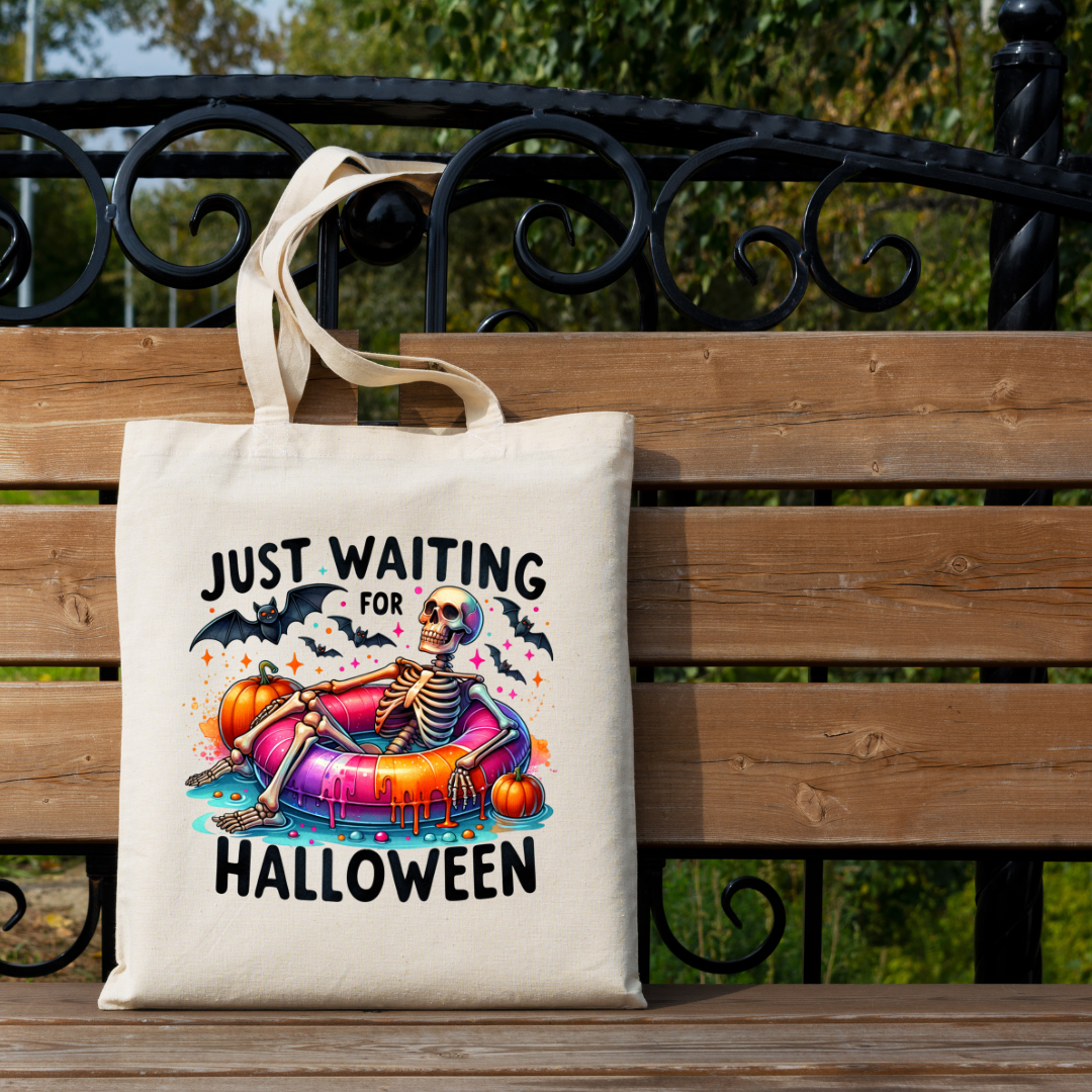 Just Waiting for Halloween tote bag with skeleton and pumpkins
