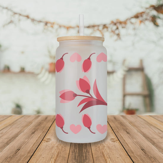 Rotating view of Born to Be a Mom glass can tumbler with bamboo lid and straw