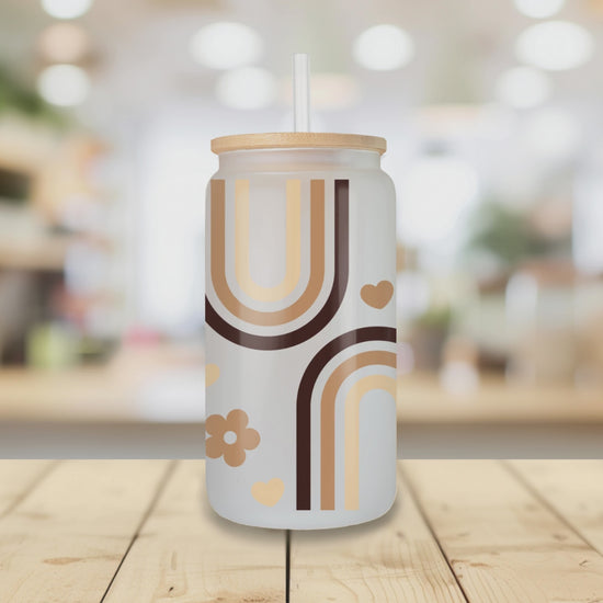 Rotating view of Best Mom Ever glass tumbler with retro rainbow design